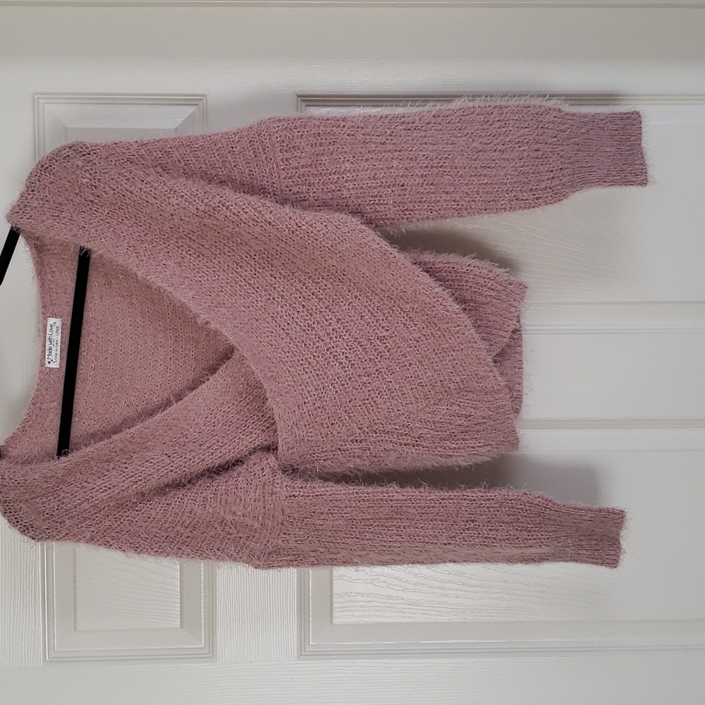 Sweater from smoke free home. Never worn.